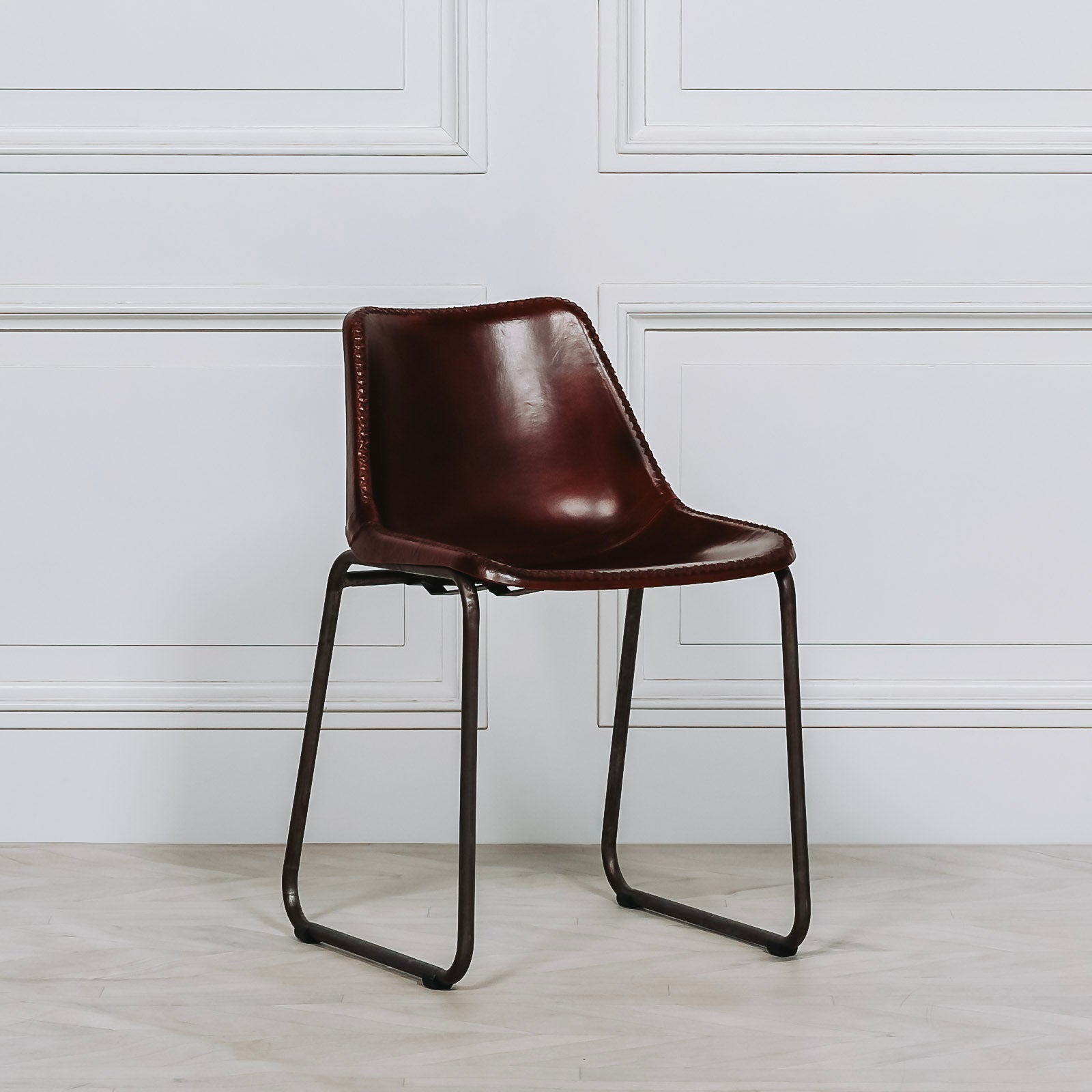 Catanzaro Industrial Leather Saddle Dining Chair
